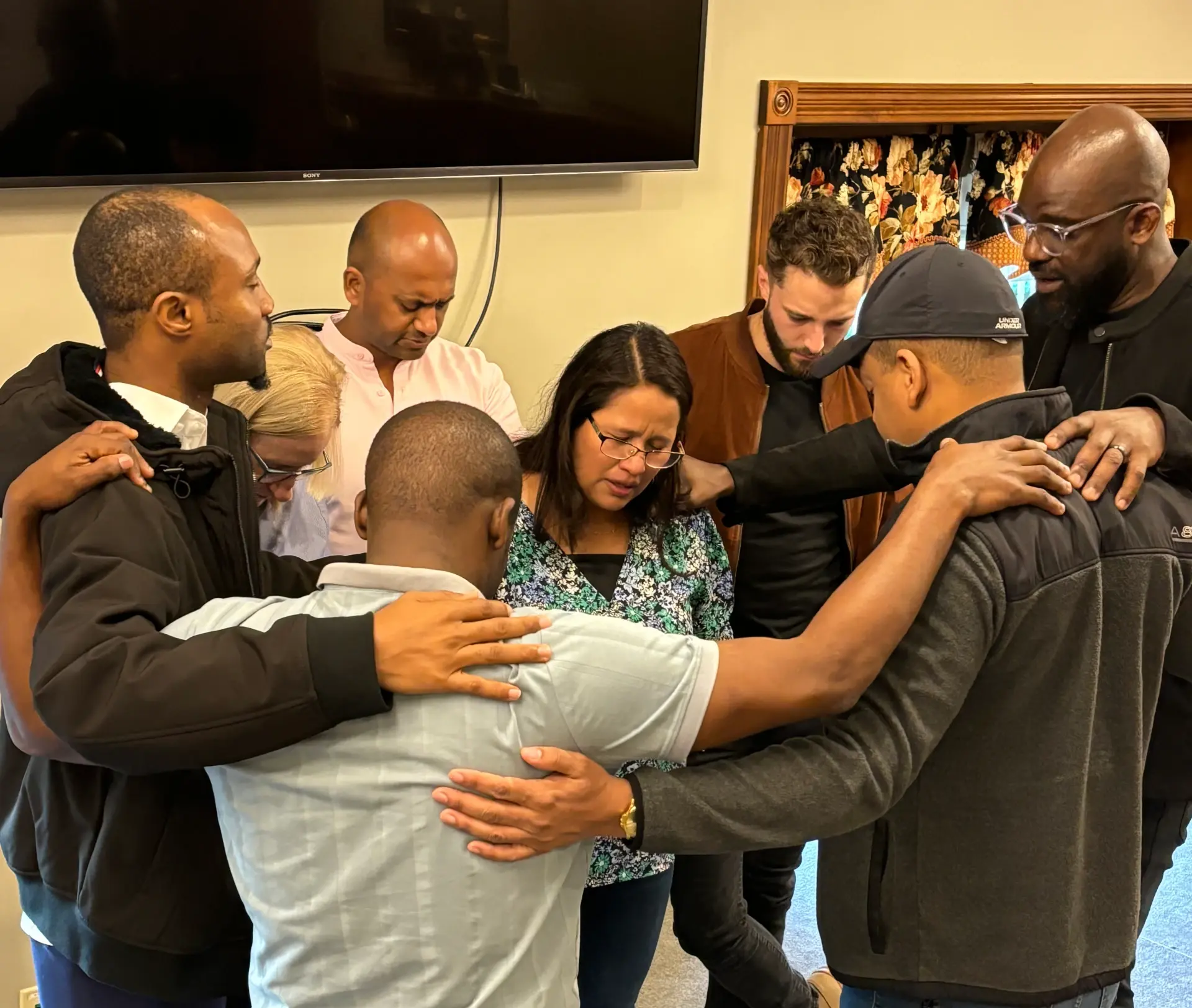 branches mentors in a circle praying