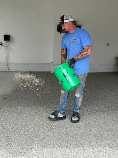 nick throwing powder from bucket
