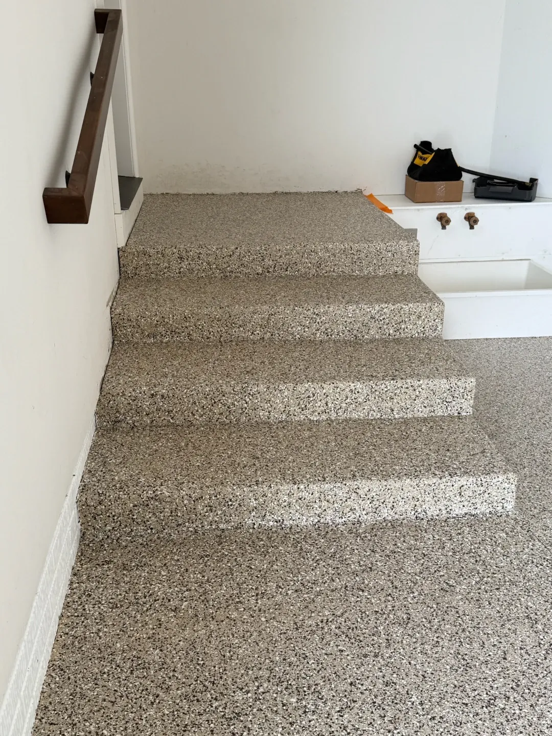 polyaspartic floor coated steps in garage (1)