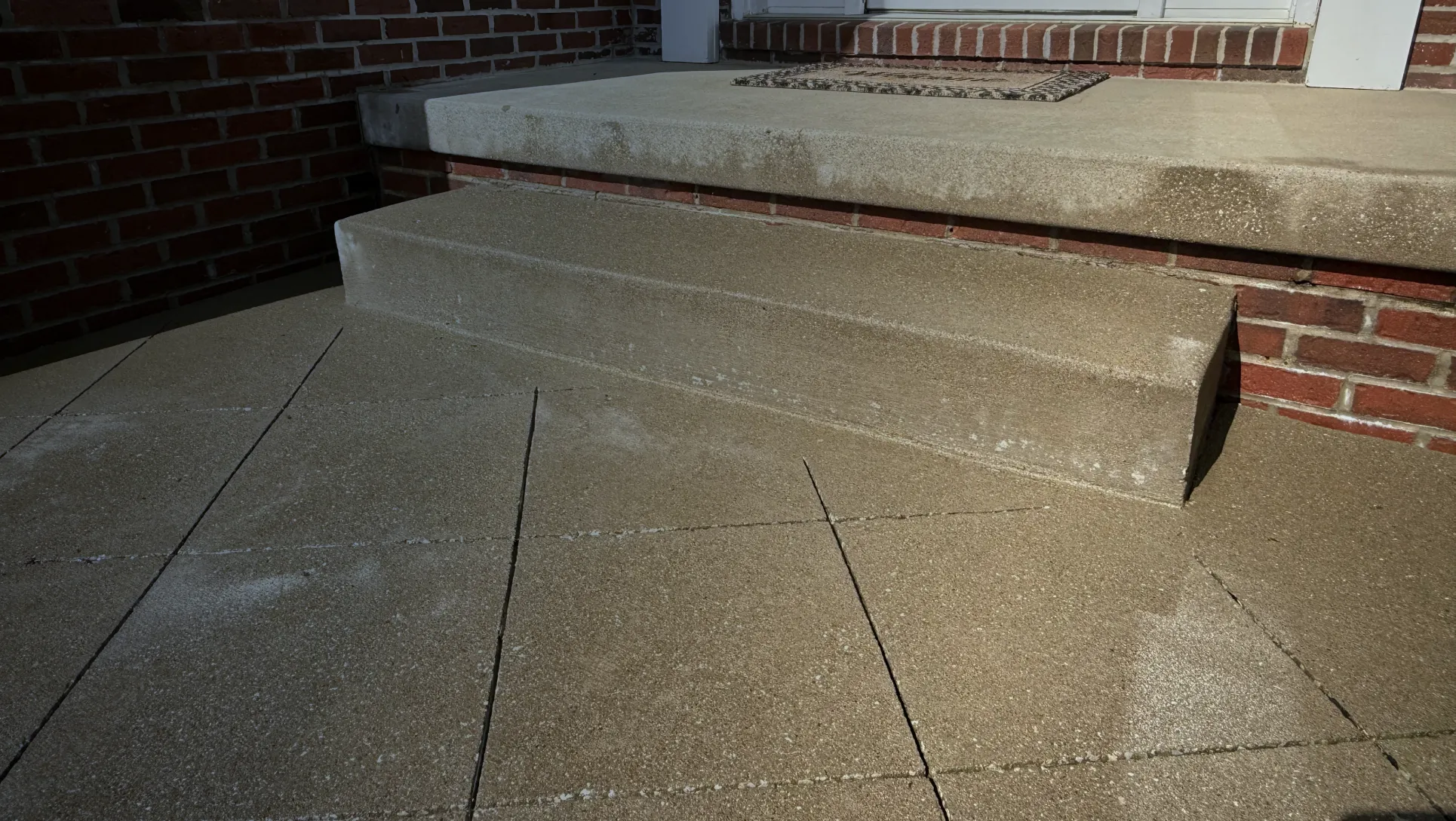 concrete walkway step lifted