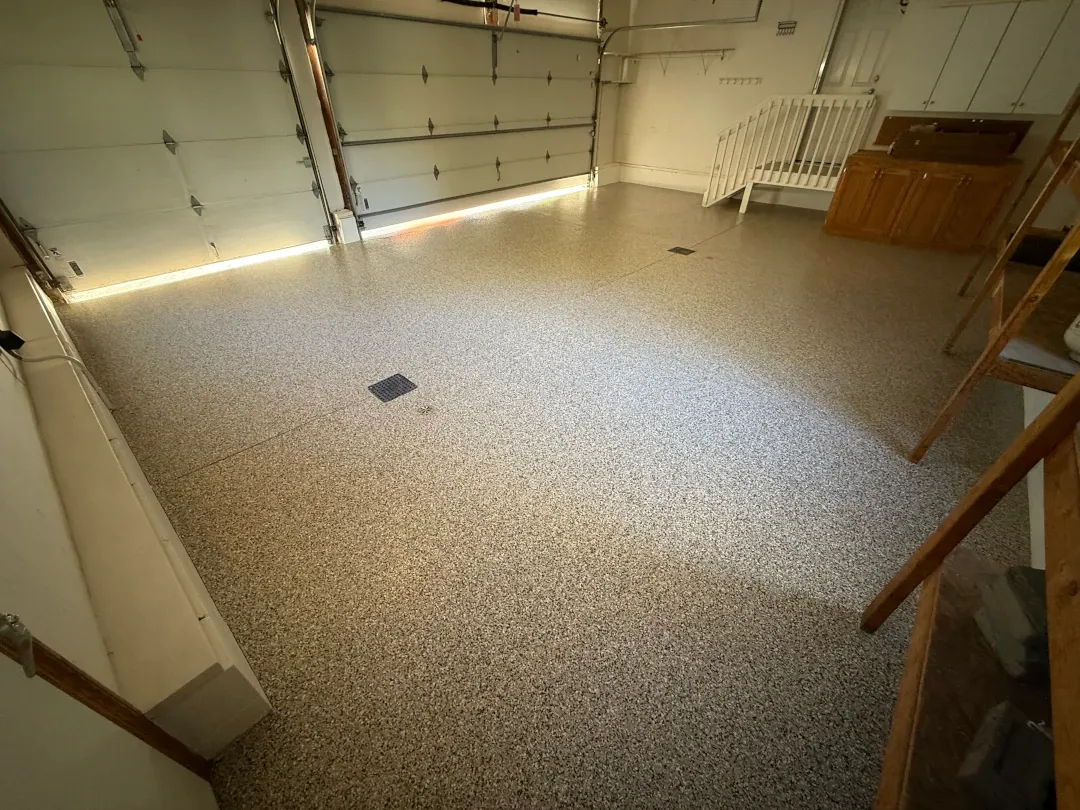 garage floor coated with garage doors cracked