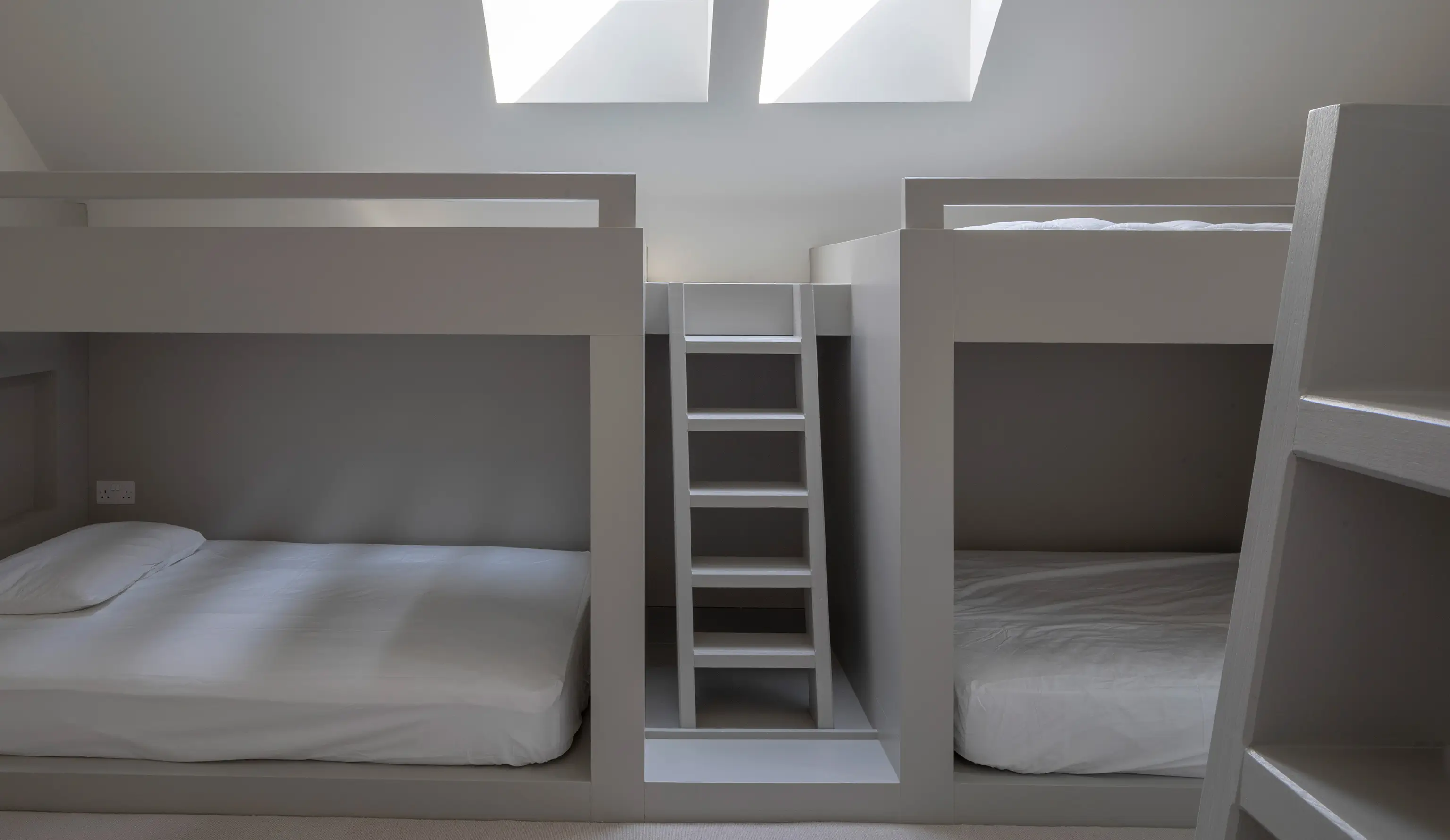 Custom bed build in contemporary home in West Sussex