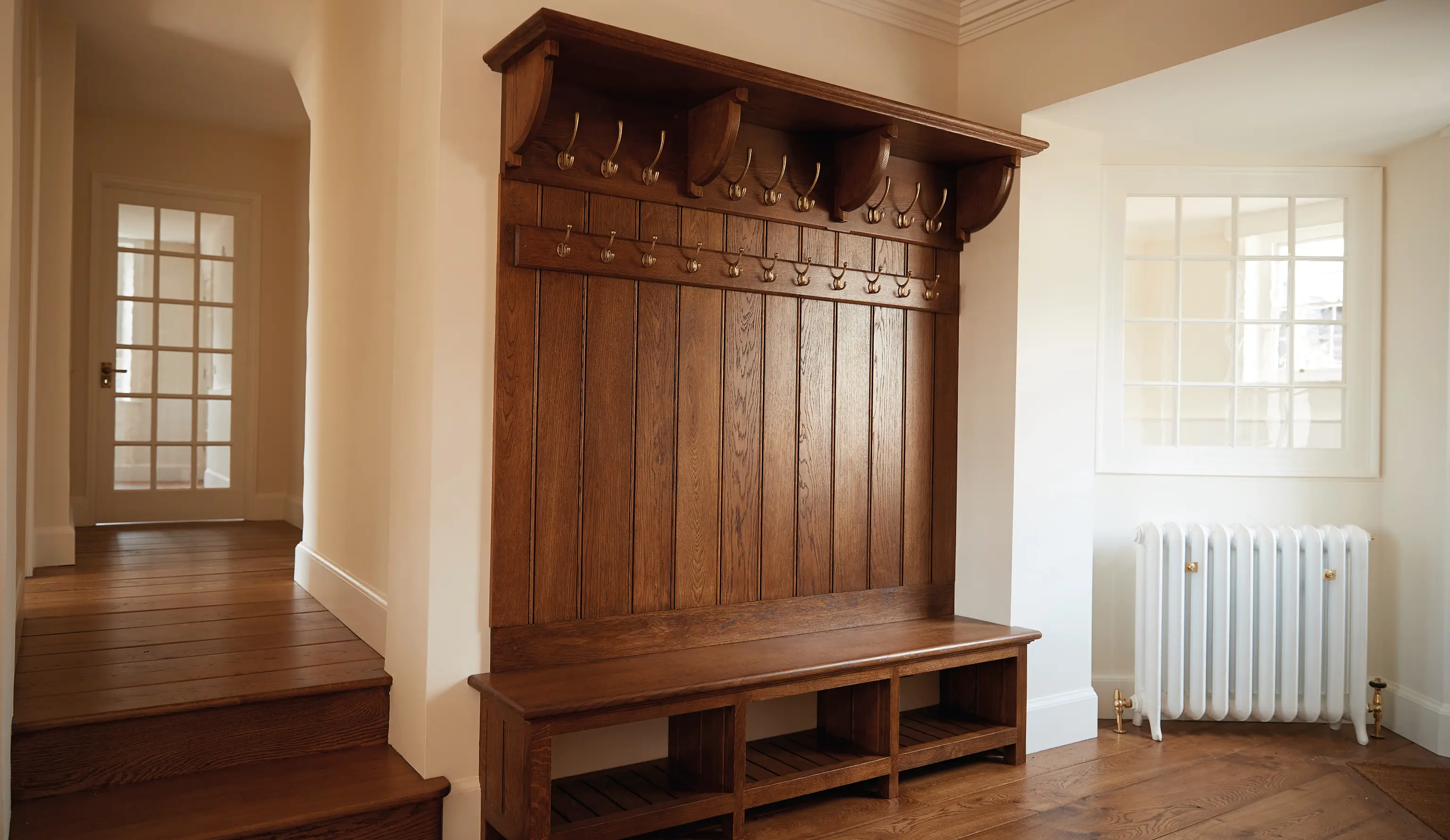 Bespoke wood panelling for boot room in Hampshire farmhouse