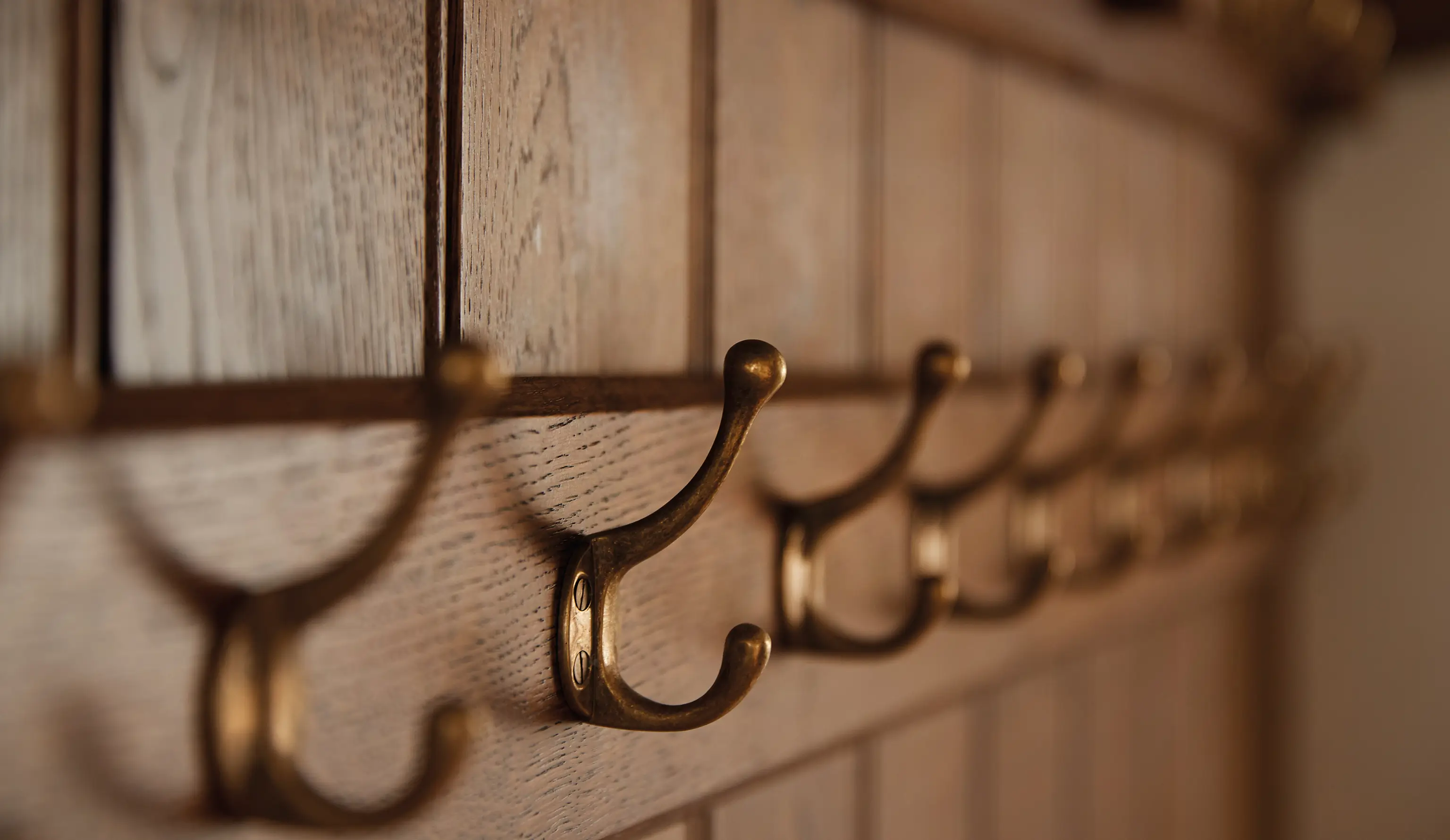 Close-up of wood panelling in farmhouse cloakroom