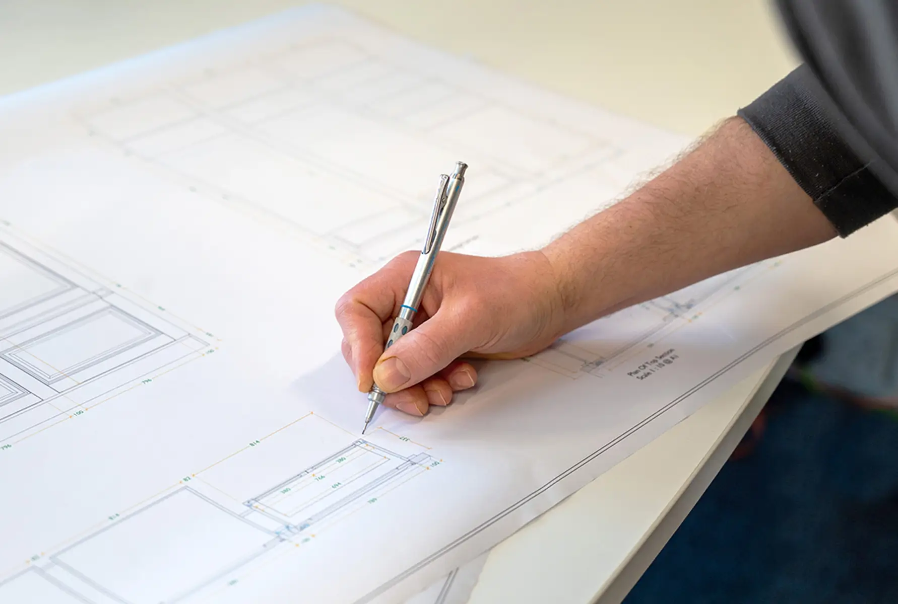 Image of plan being measured