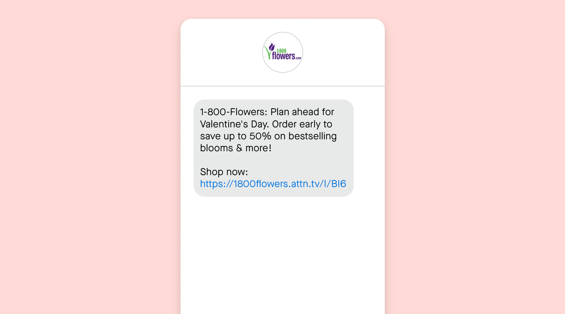 Valentine's Day text message from 1-800-Flowers on a pink background
