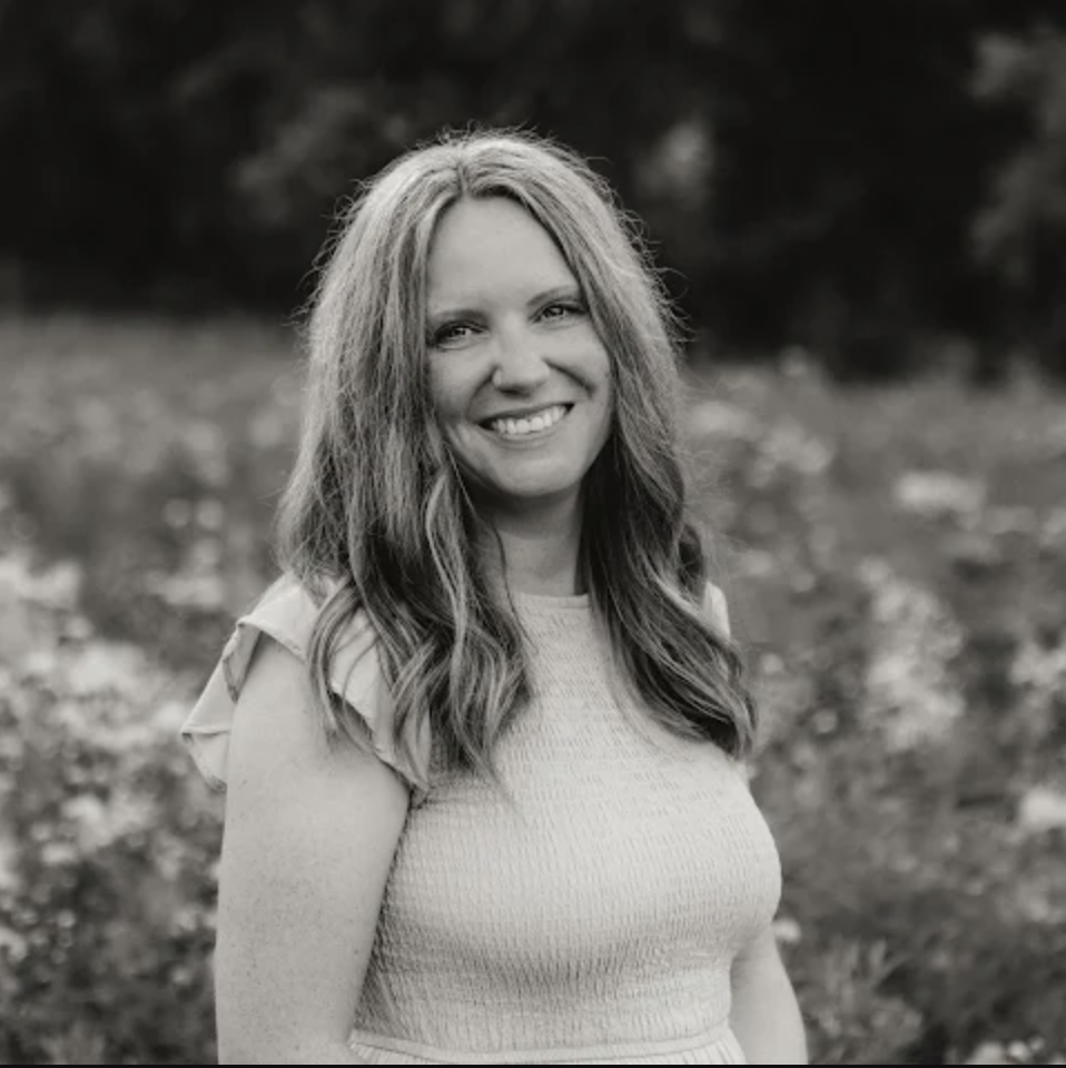 brunette woman with jeans textured shirt