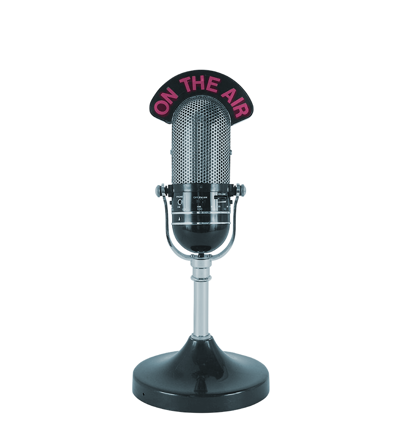 A vintage microphone with the words 'on the air' above it