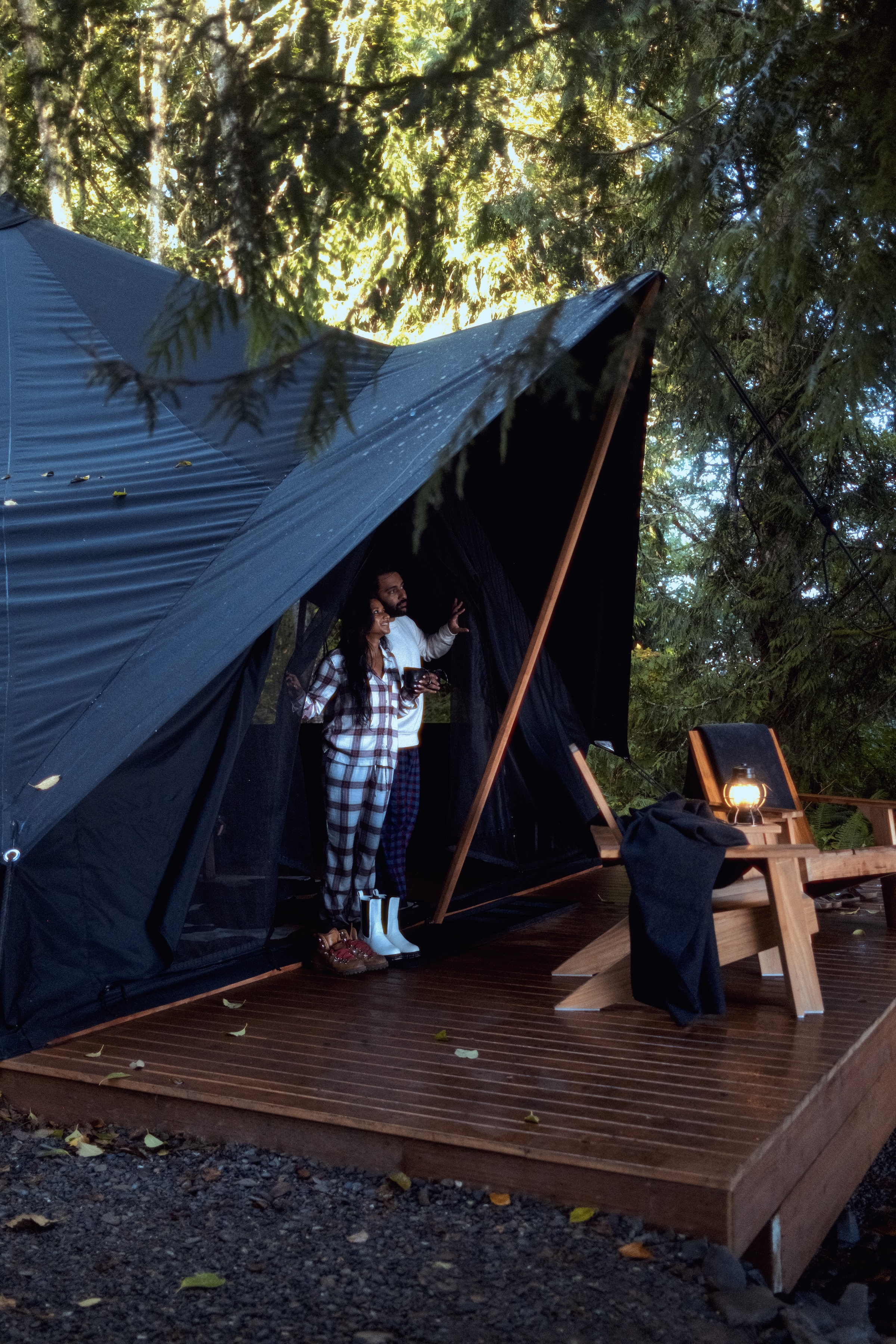 Couple relaxing in a private cedar sauna during a romantic getaway at Menizei, a quiet-luxury retreat in Washington State