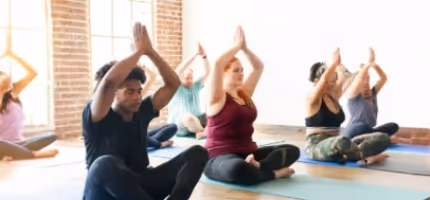 yoga class with people sitting
