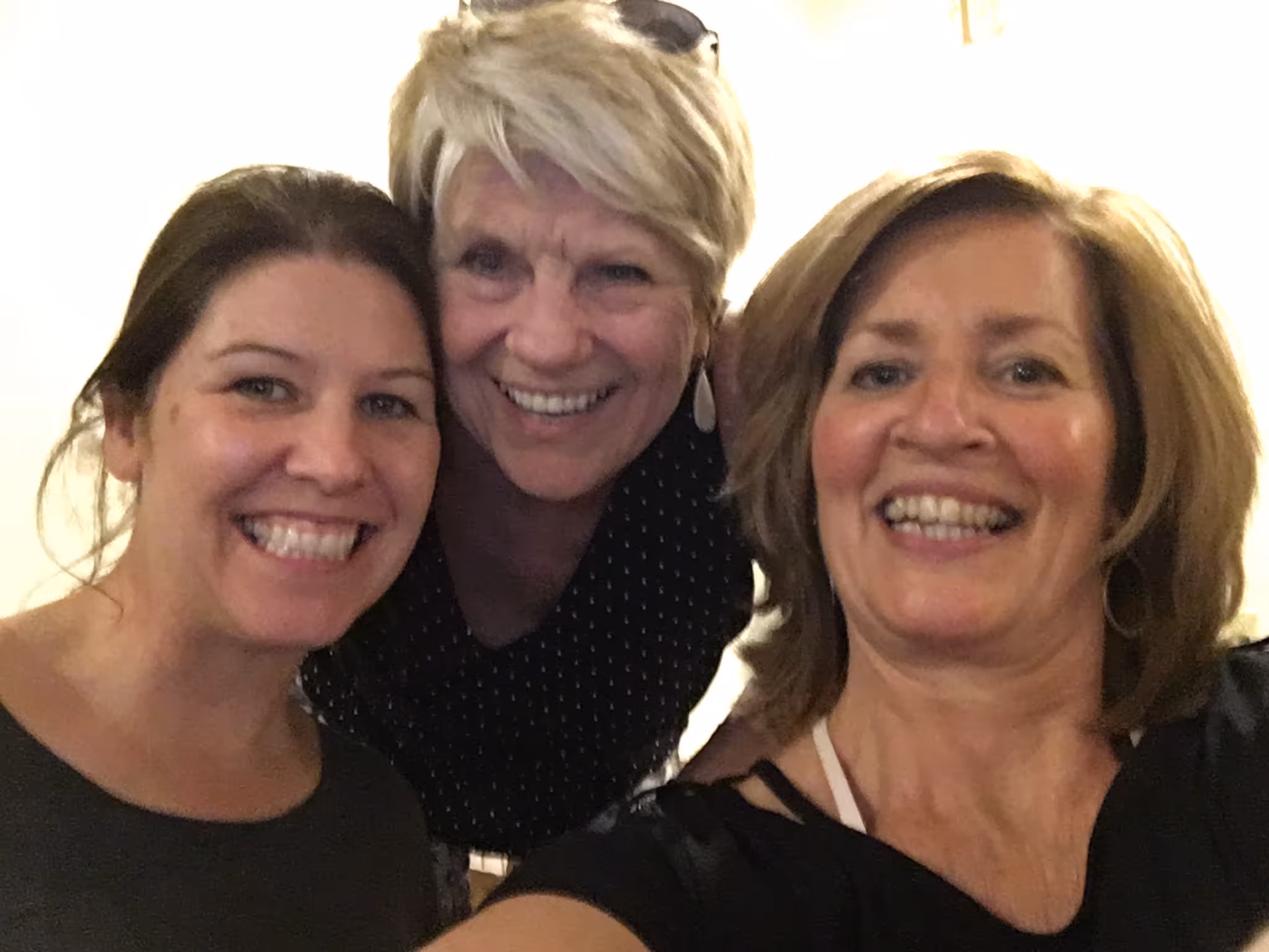 3 smiling women