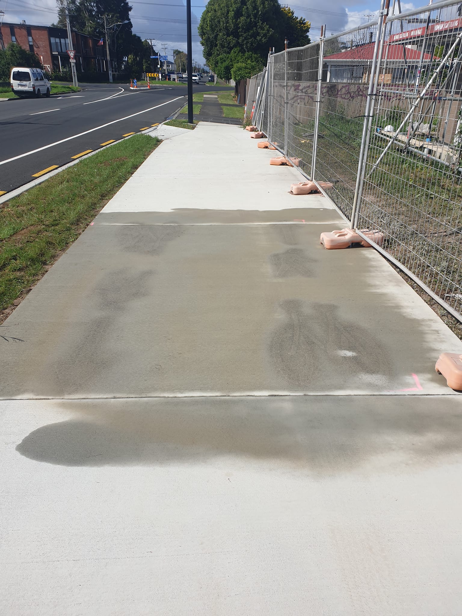 Concrete cleaning and surface preparation on shared commercial pathway