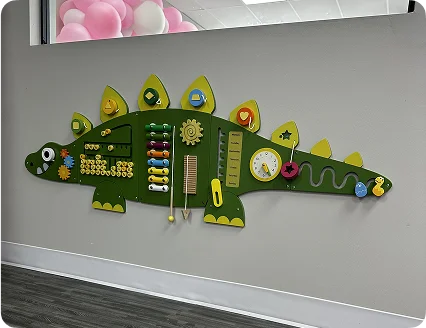 An image of a wall decoration in a children's activity room.