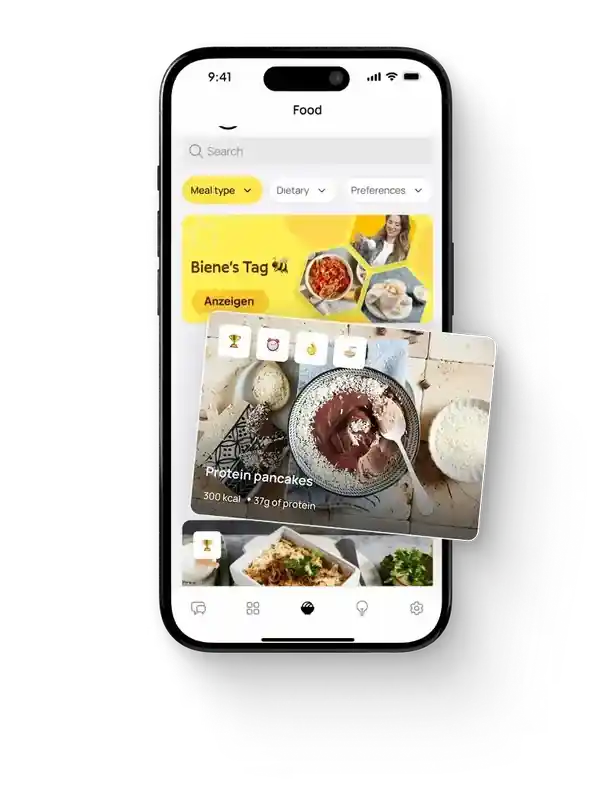 WPF Community - Ein Smartphone mit einer Food-App wird schräg von oben gezeigt. Auf dem Bildschirm sind verschiedene Gerichte und die Aufschrift "Biene's Tag" zu sehen.