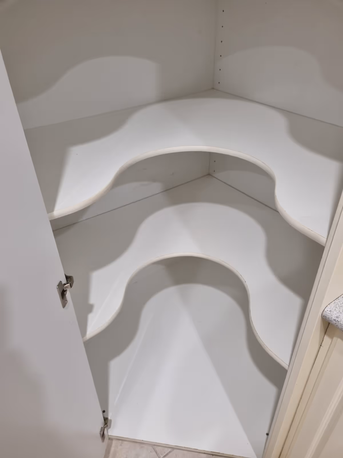 after photo of a clean cupboard