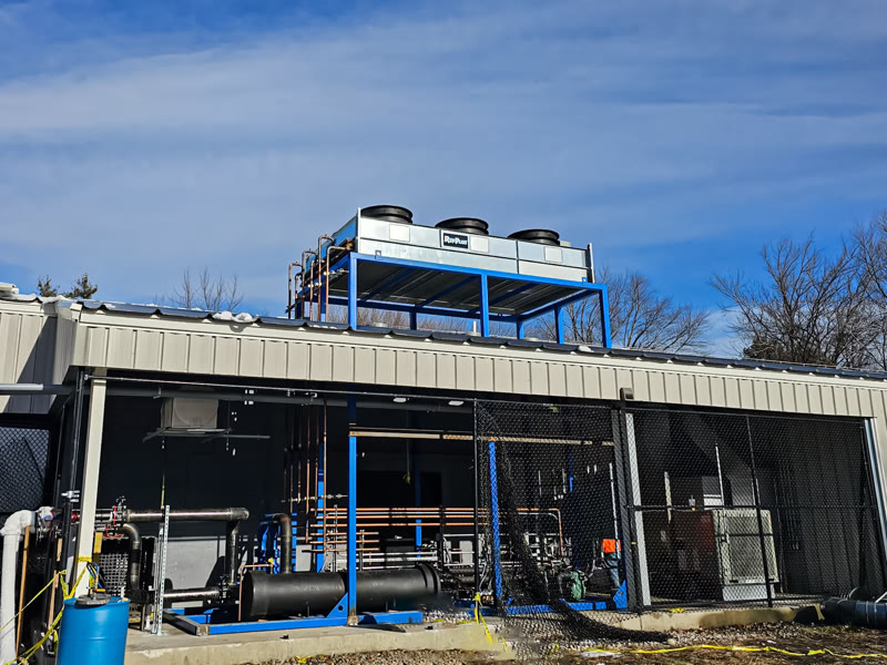 Custom industrial refrigeration system with cooling units and piping installed by Northstar Refrigeration at Casco Bay Ice Arena