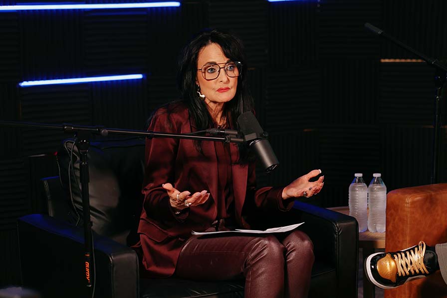 Pastor Karen speaking while sitting in studio