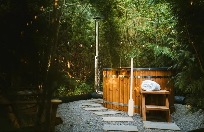 Hot tub set in private woodlands, a few meters walk from the shepherds hut.
