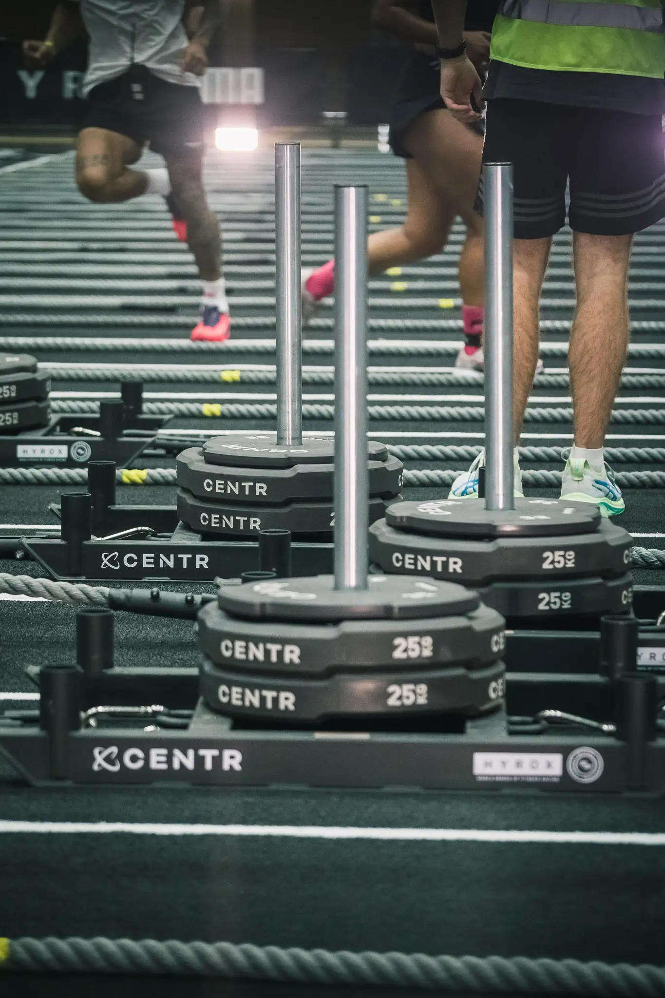 Athletes moving across the race floor at HYROX Cape Town — HYROX photographer Cape Town