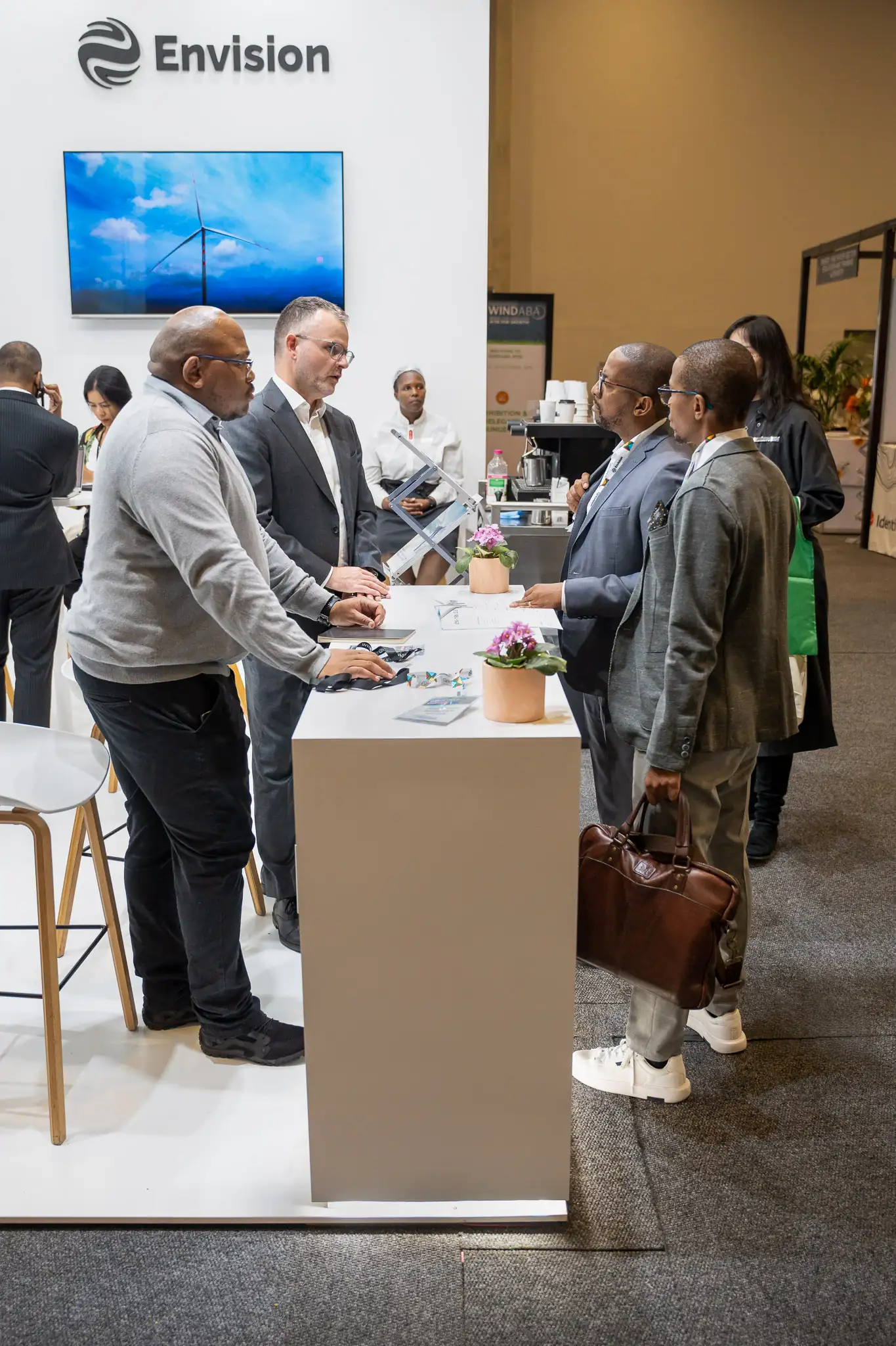 Networking at the Envision Energy booth at Windaba — Envision Energy Windaba photographer Cape Town
