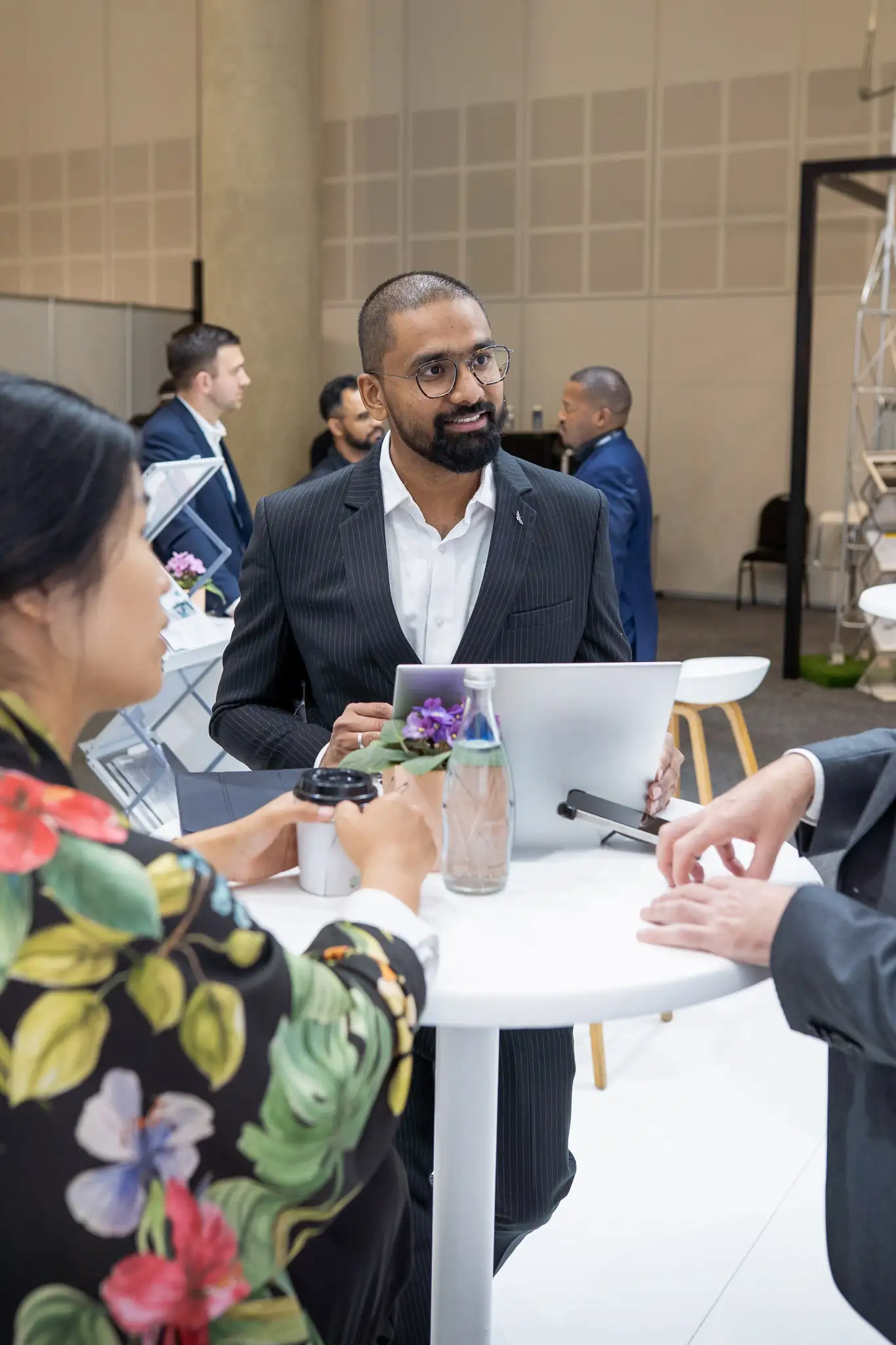 Discussion at a Windaba booth — conference photographer Cape Town CTICC