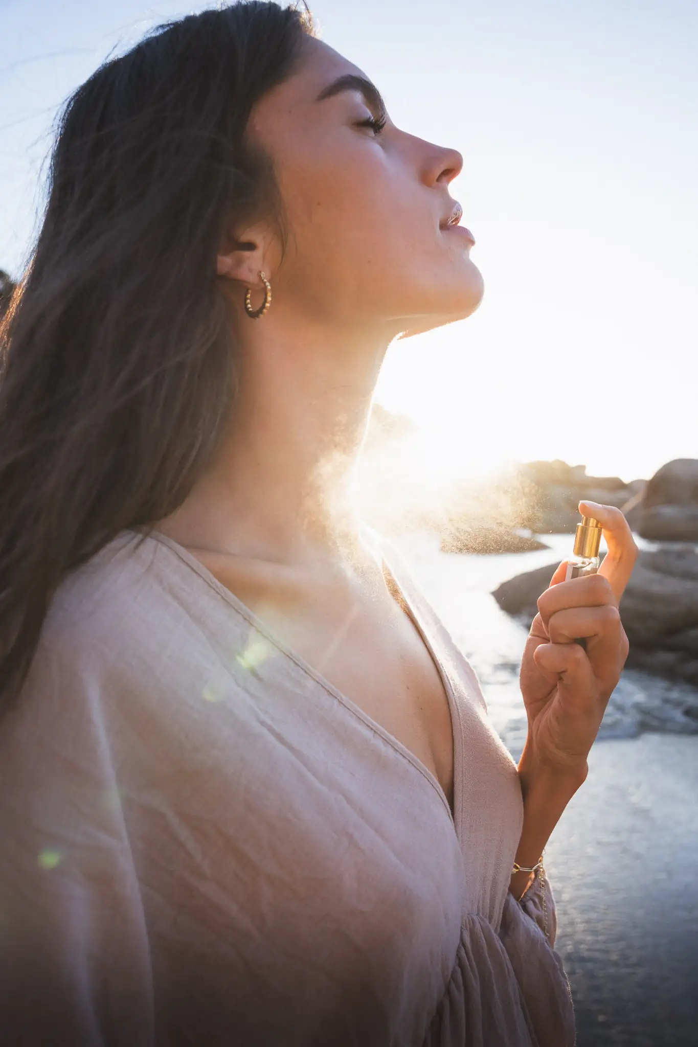 Lifestyle portrait in golden light with a drink — lifestyle brand photographer Cape Town