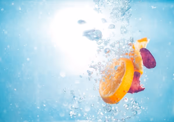 photo of sliced lemon on water