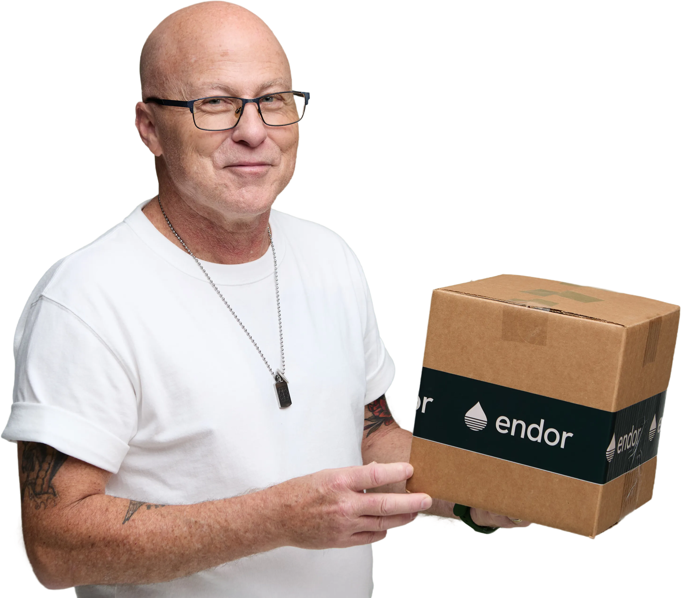 A happy Endor Health customer holding a branded shipment box used to receive diabetes drugs and devices with free delivery
