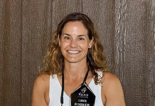 Erin Rooker earns the Volunteer of the Year Award from the TBRS Community