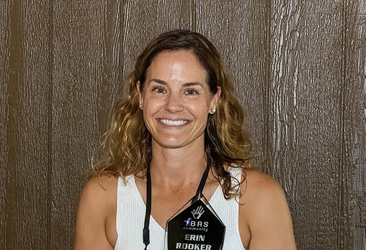 Erin Rooker earns the Volunteer of the Year Award from the TBRS Community