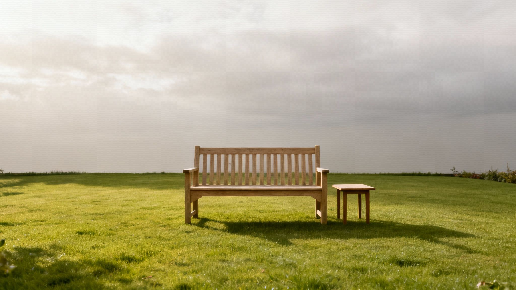 A stylish wooden outdoor furniture set on a modern patio.