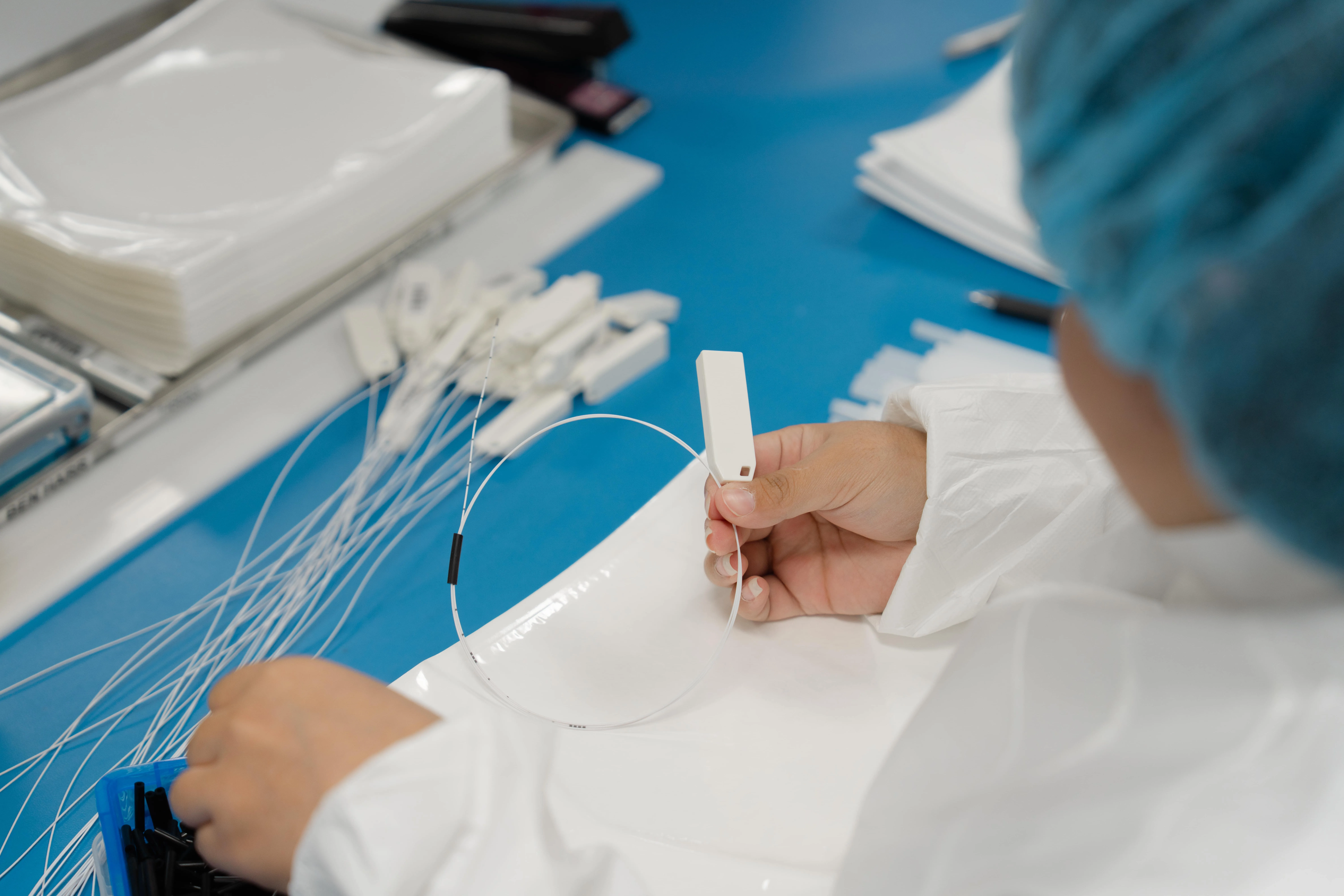 A Millar employee works on a catheter in Millar’s ISO Class 7 clean room. 