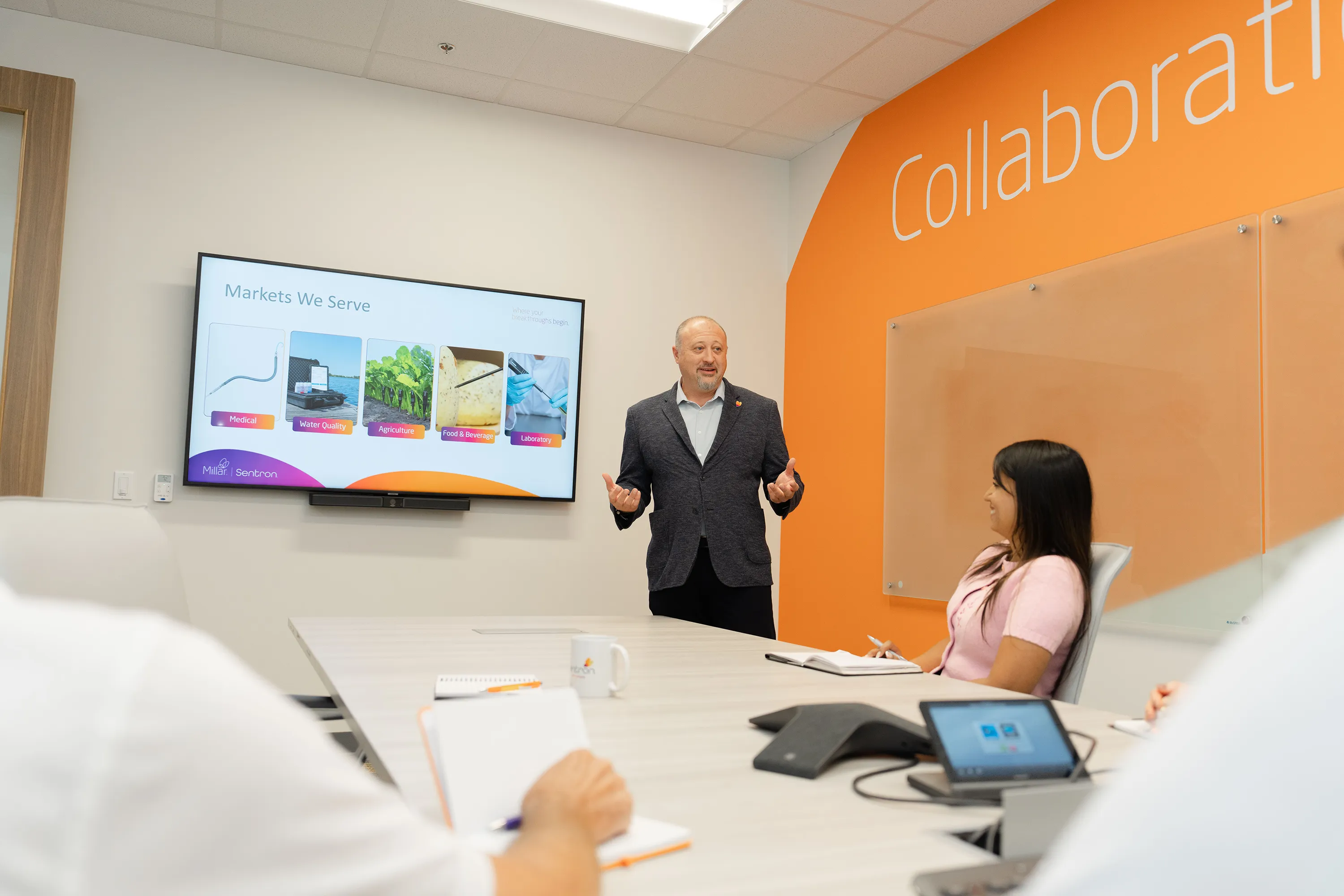 A Millar employee presents during a discovery meeting.