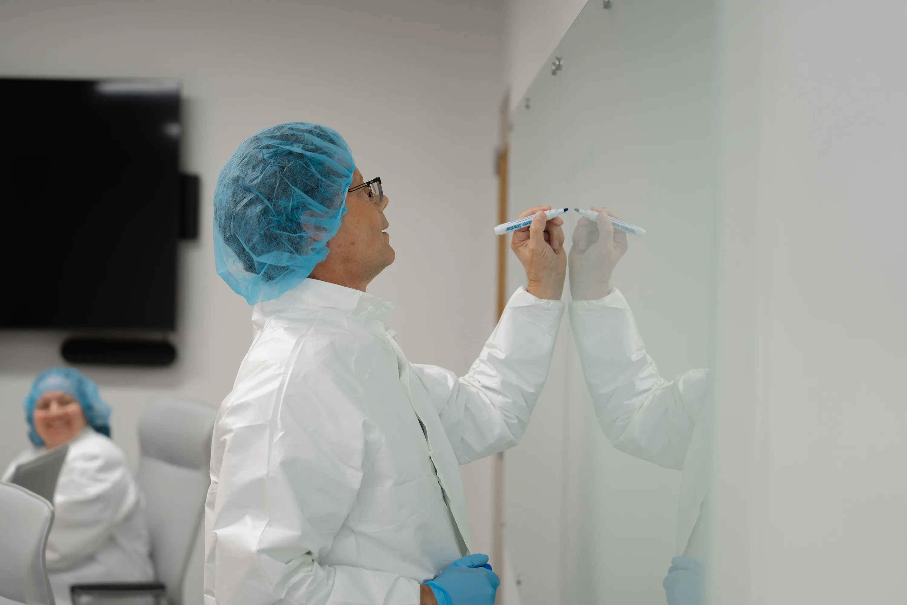 A Millar employee writes on a whiteboard at Millar’s headquarters in Pearland, Texas.