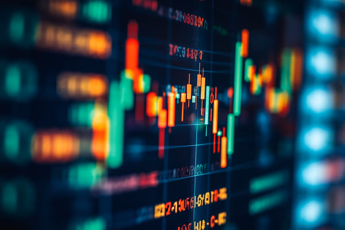 A graphic of a stock market with green and orange lines.