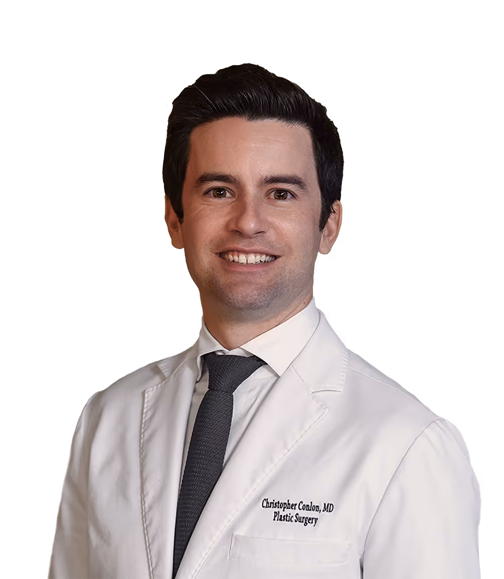 Headshot of Dr. Conlon wearing a tie and white coat.