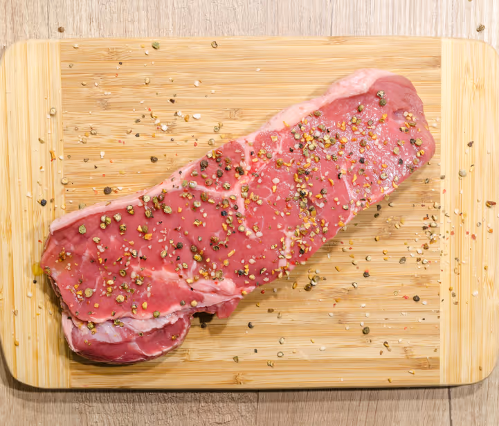 Picture of a steak on a cutting board