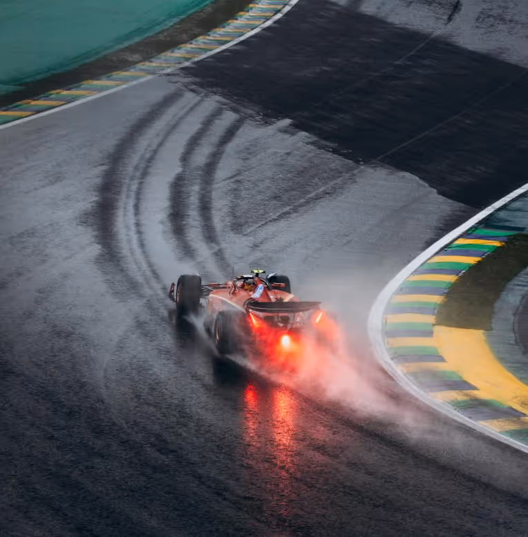 Race car on a track in the rain