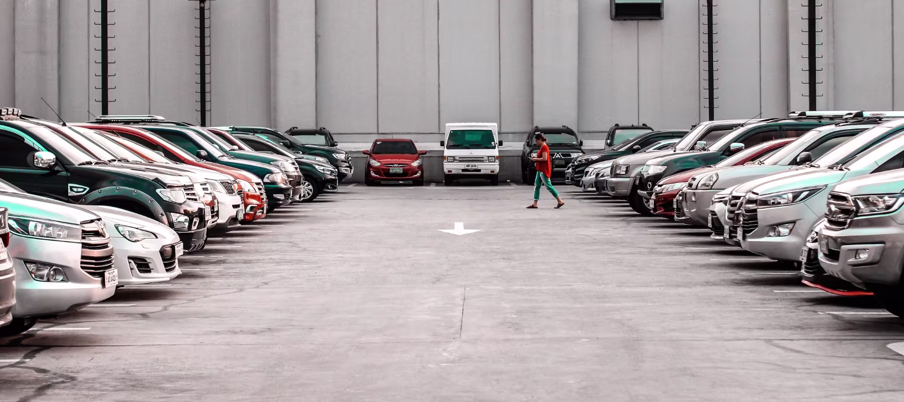 woman walking in parking lot