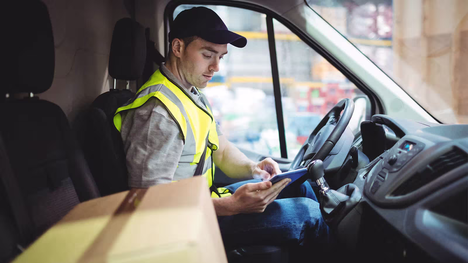 delivery driver in delivery van