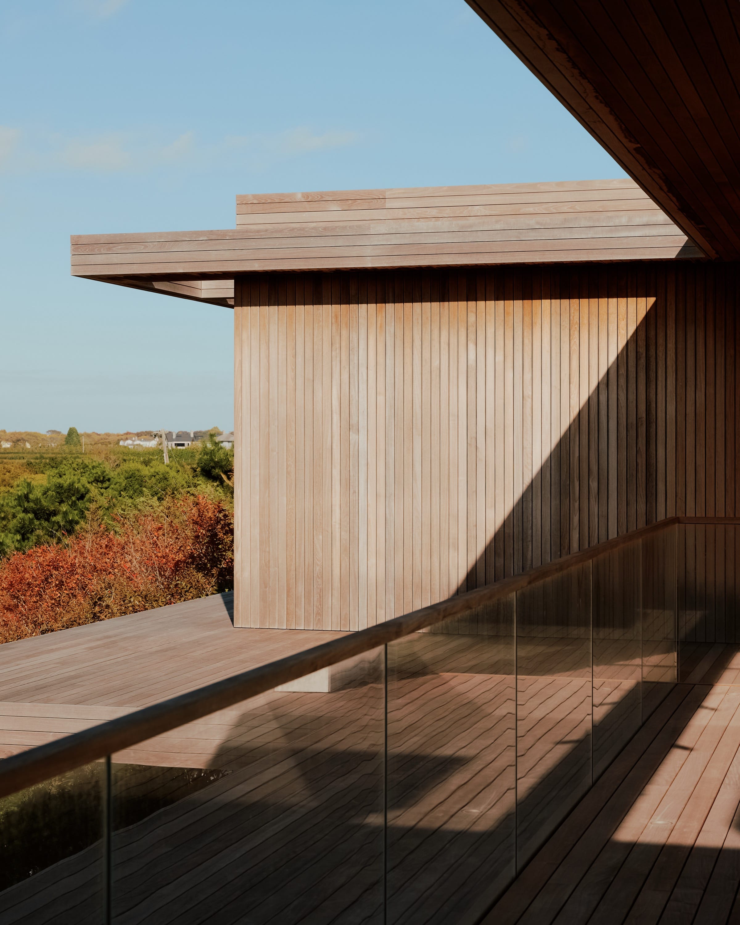 Courtyard view framed by wood architecture.