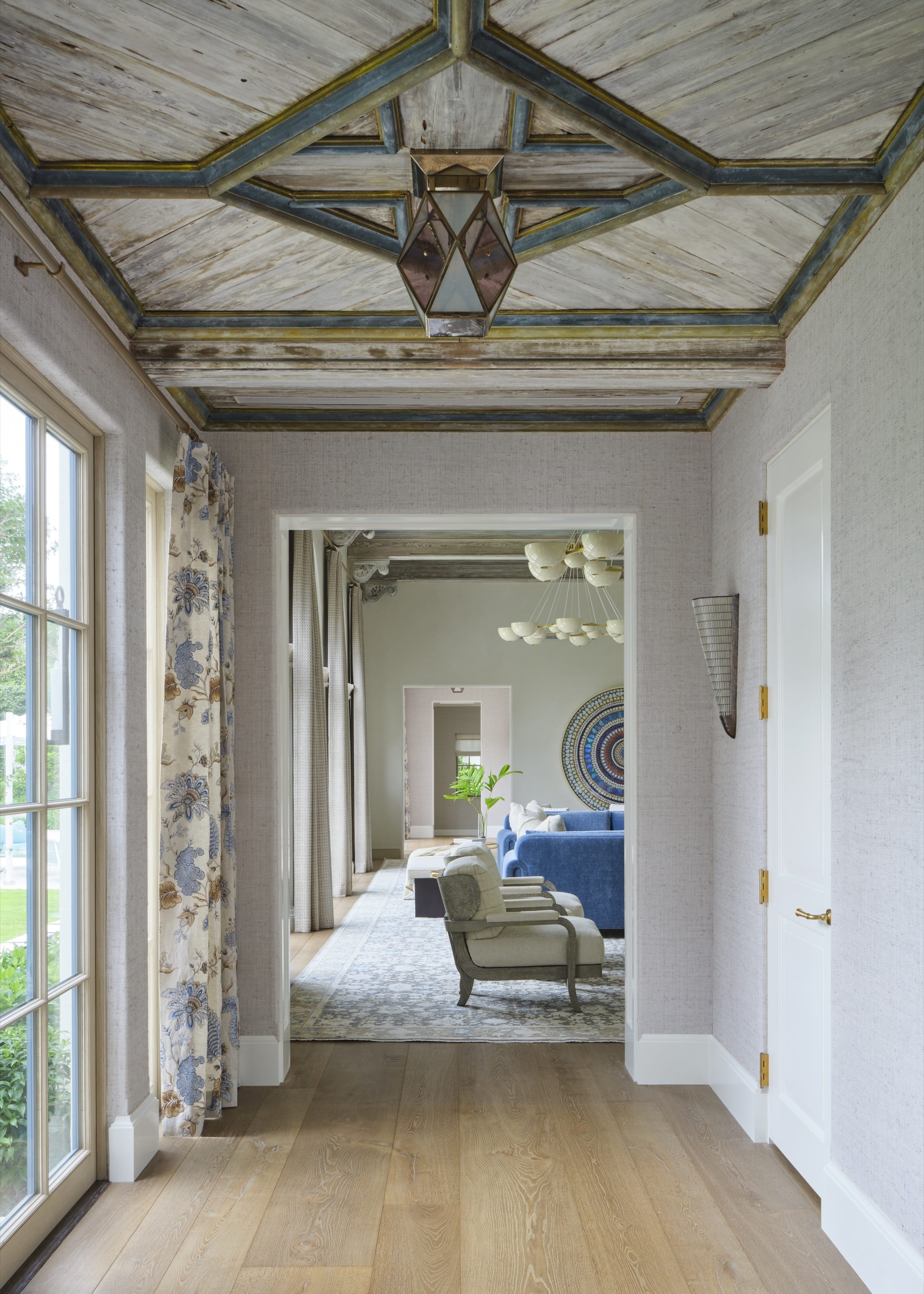 Hallway with wood beams and natural light.