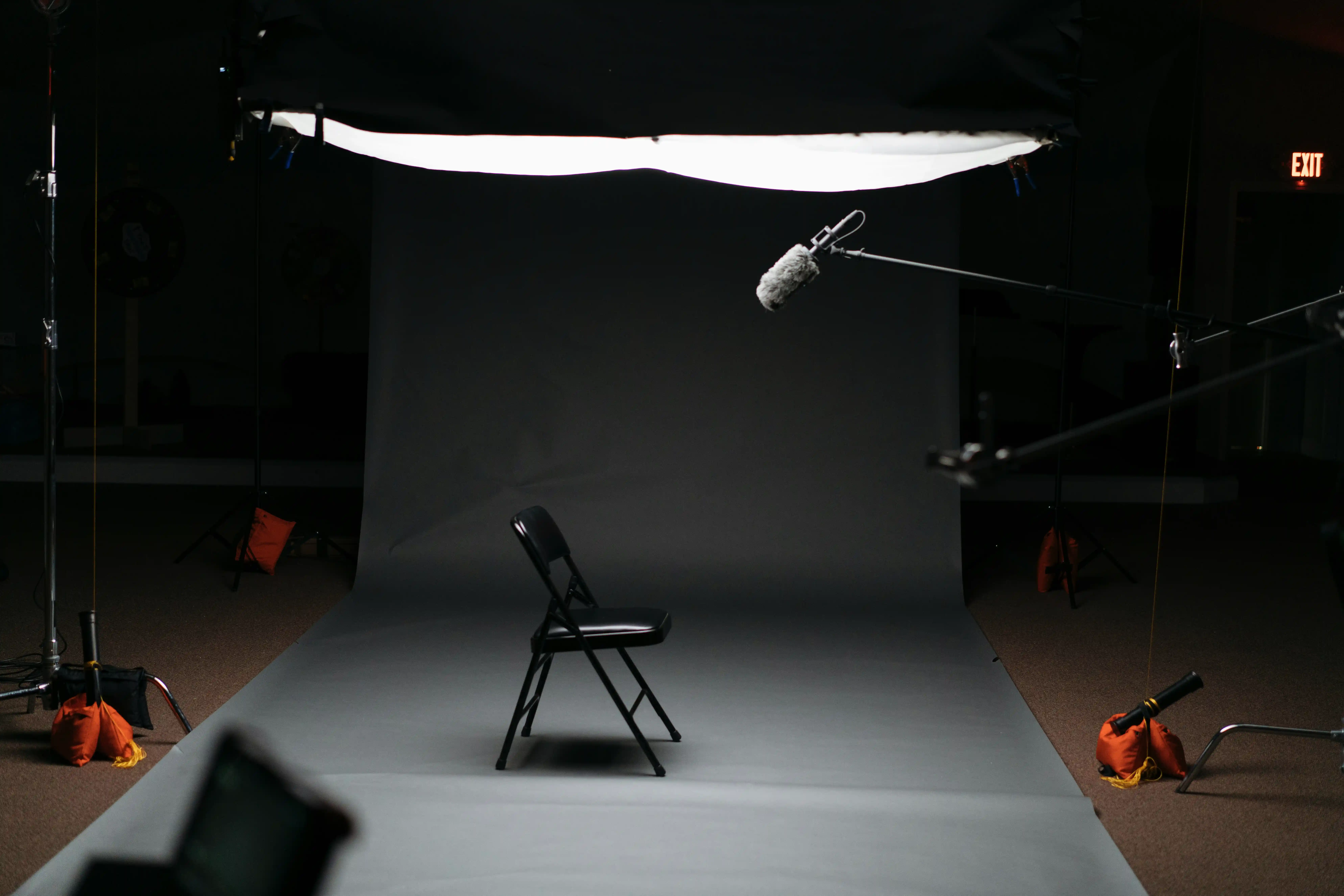 empty folding chair with a microphone