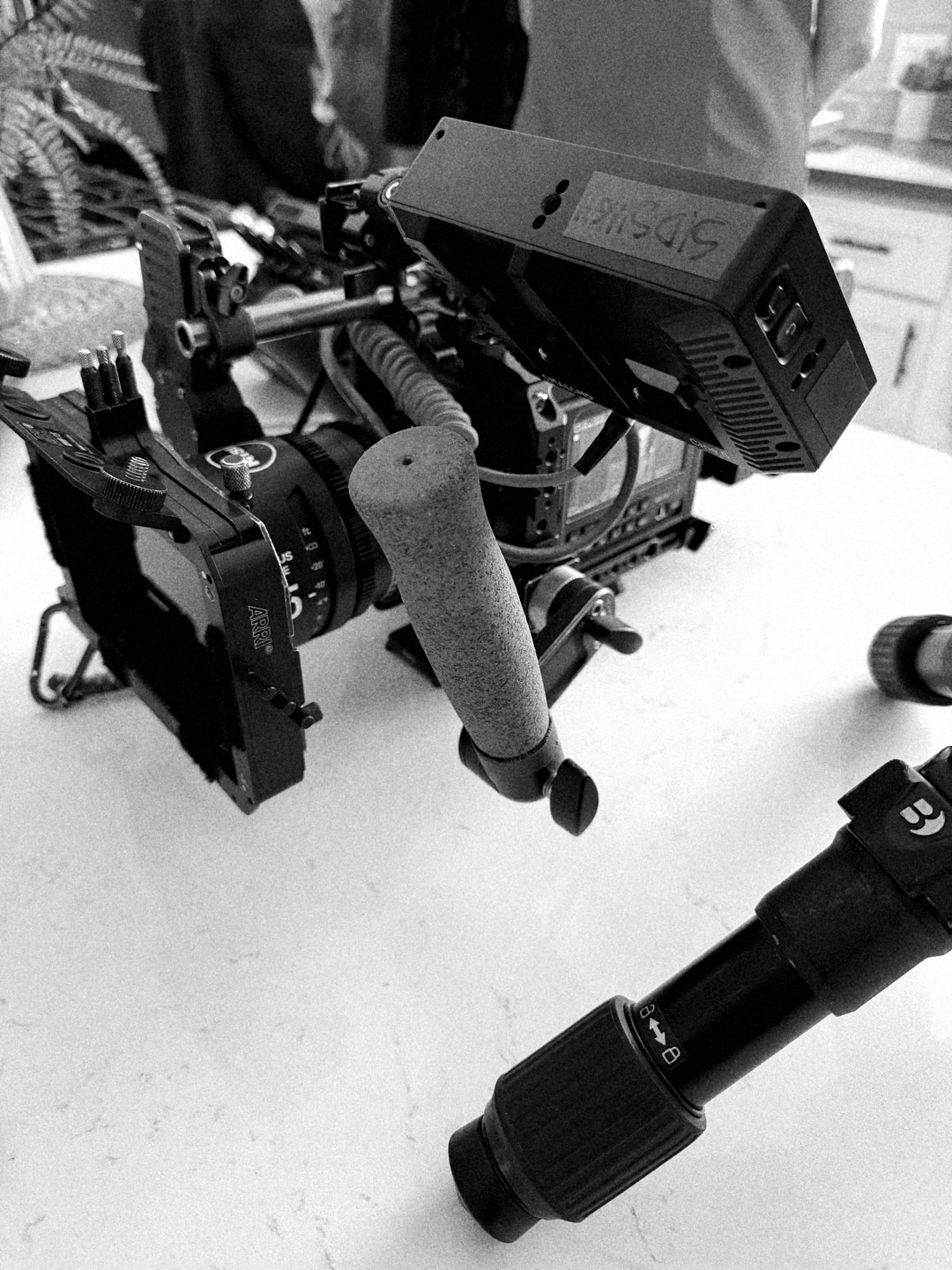 ARRI camera body and tripod on set during the Everyday Dose shoot