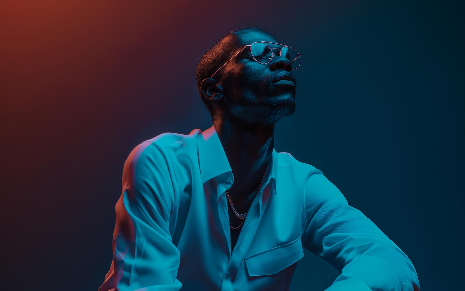 Man in the white shirt on the blue background. 