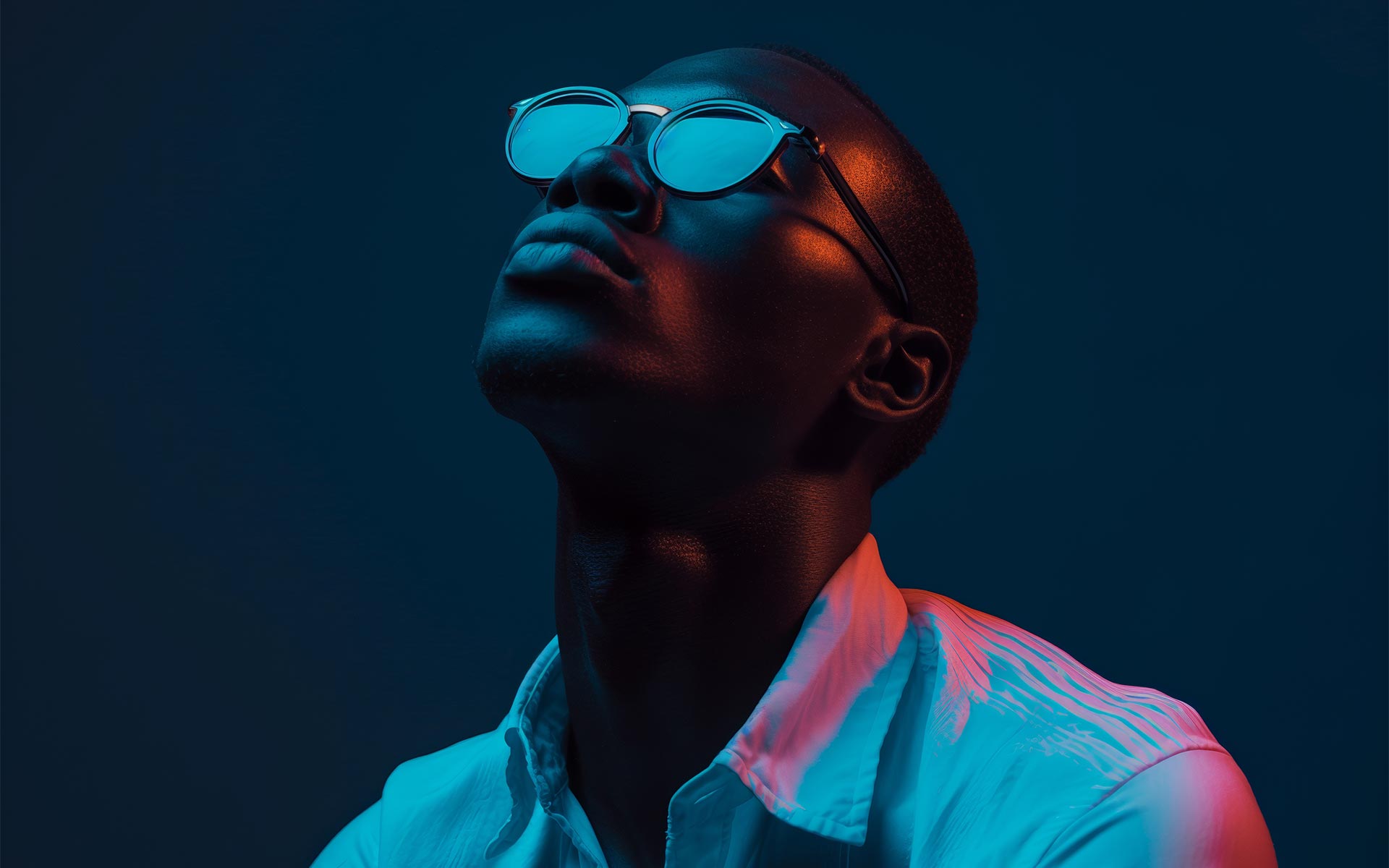 Man in the white shirt on the blue background. 
