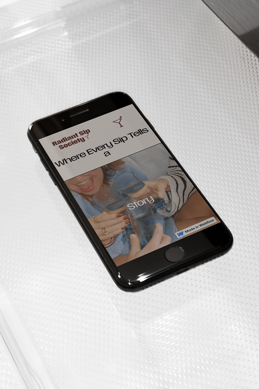 phone mockup of Radiant Sip Society homepage of website