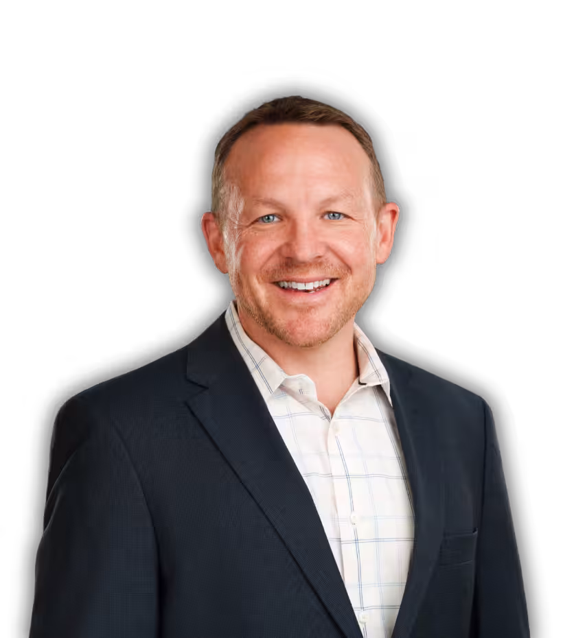 Portrait of Charlie Linder in a navy blue suit