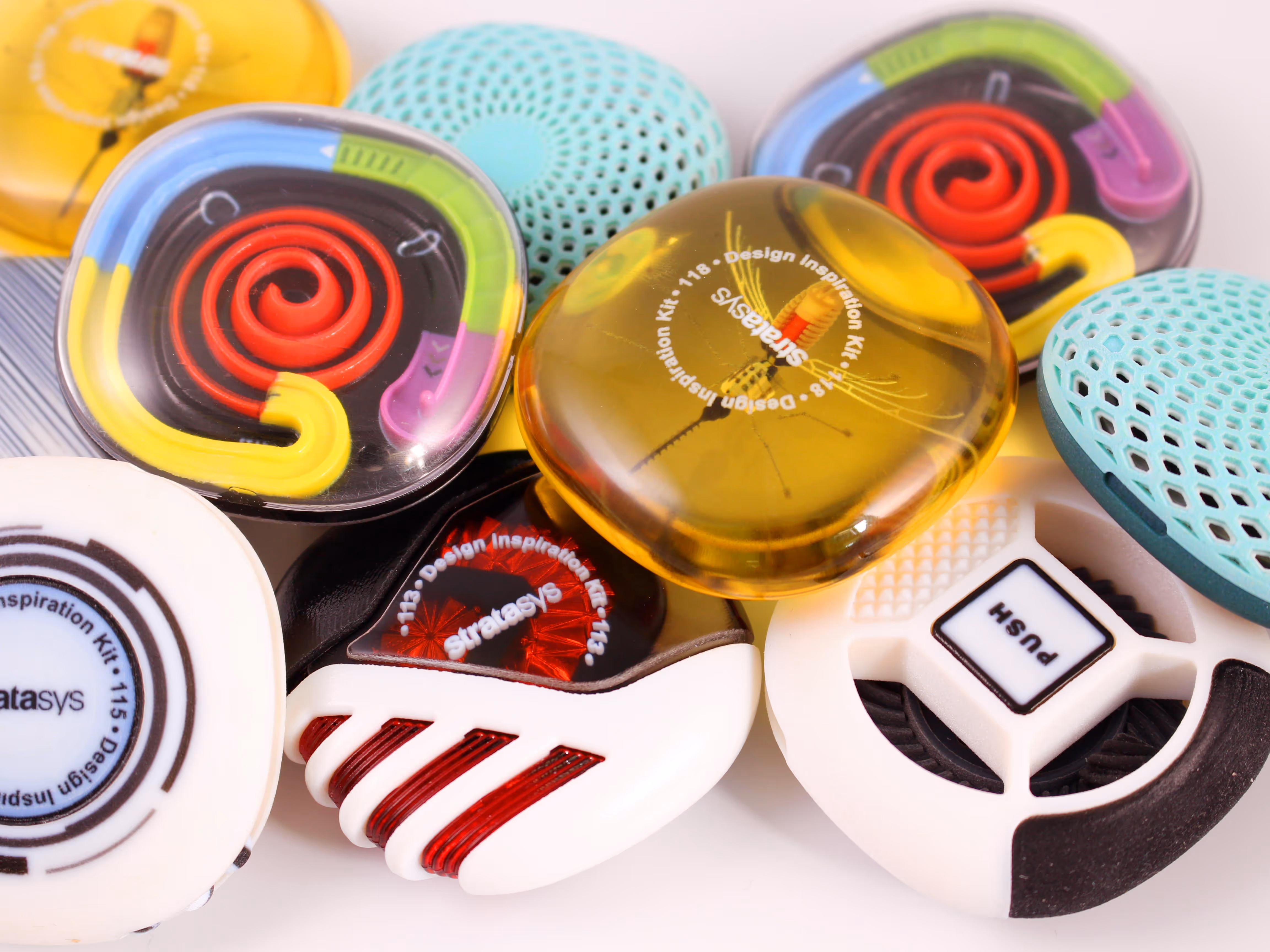 Close-up of colorful Stratasys Design Inspiration Kit pieces with various shapes and textures.