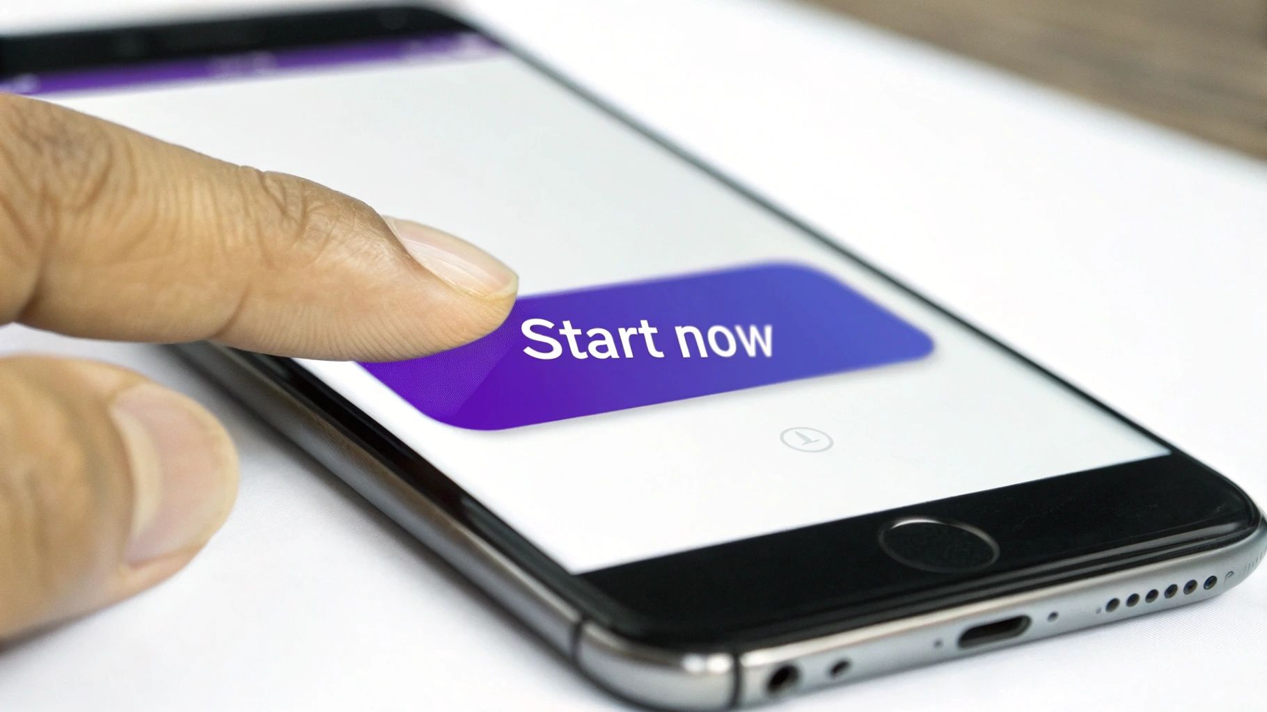 A finger taps a smartphone screen displaying a purple 'Start now' button, emphasizing action.